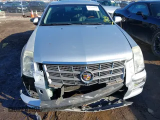 2010 Cadillac STS AWD with VIN 1G6DU6EV8A0120484, listed as a IAAI auction lot 41528974 with 89,489 mi miles and . Bid and sale history available at carsss.com. Image 6.