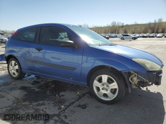 2004 Ford Focus ZX3 with VIN 3FAFP313X4R123879, listed as a Copart auction lot 54052055 with 174,692 mi miles and Salvage Title. Bid and sale history available at carsss.com. Image 4.