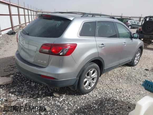 2014 Mazda CX-9 Touring with VIN JM3TB2CA1E0434353, listed as a IAAI auction lot 41836889 with 151,128 mi miles. Bid and sale history available at carsss.com. Image 4.