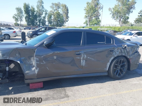 2019 Dodge Charger R/T z VIN 2C3CDXCT7KH527732, wystawiony jako IAAI lot #42283453 z przebiegiem 99 755 mil mil oraz . Historia ofert i sprzedaży dostępna na DreamBid. Obrazek 18.