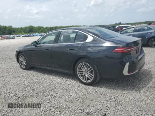 2024 BMW 5 Series 530i with VIN WBA43FJ09RCR05243, listed as a Copart auction lot 61690705 with 34,450 mi miles and Salvage title. Bid and sale history available at DreamBid. Image 2.