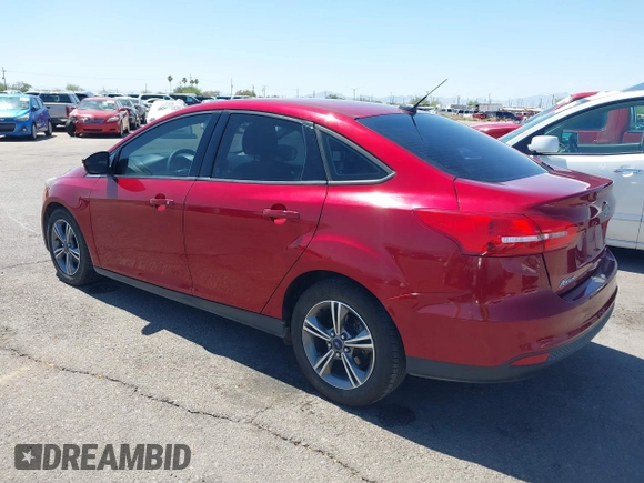 2017 Ford Focus SE with VIN 1FADP3FE3HL206074, listed as a IAAI auction lot 42594911 with 143,814 mi miles and . Bid and sale history available at DreamBid. Image 3.