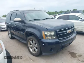 2007 Chevrolet Tahoe LS z VIN 1GNFC13C77R299755, wystawiony jako IAAI lot #42036191 z przebiegiem 196 923 mil mil oraz . Historia ofert i sprzedaży dostępna na DreamBid. Obrazek 1.