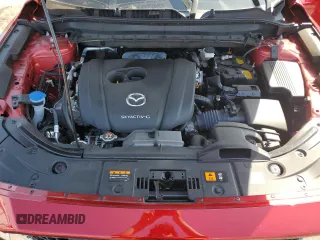 2023 Mazda CX-5 S Select with VIN JM3KFBBM2P0242664, listed as a Copart auction lot 55022895 with 14,129 mi miles and Salvage Title. Bid and sale history available at DreamBid. Image 12.