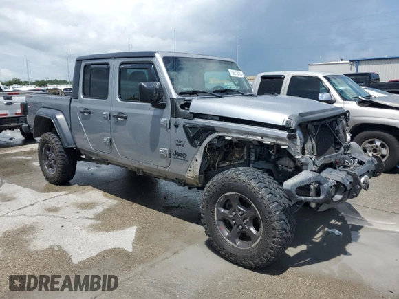 2020 Jeep Gladiator Sport S with VIN 1C6JJTAG9LL149872, listed as a Copart auction lot 58518095 with 118,910 mi miles and Salvage title. Bid and sale history available at DreamBid. Image 4.