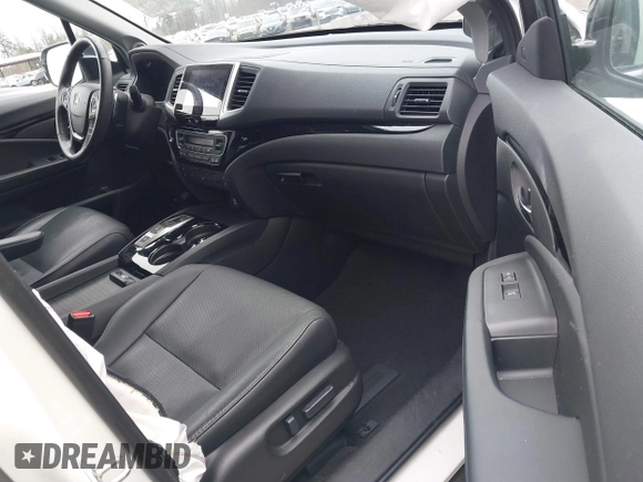 2017 Honda Pilot Elite with VIN 5FNYF6H06HB096156, listed as a IAAI auction lot 41771161 with 73,889 mi miles and . Bid and sale history available at DreamBid. Image 5.