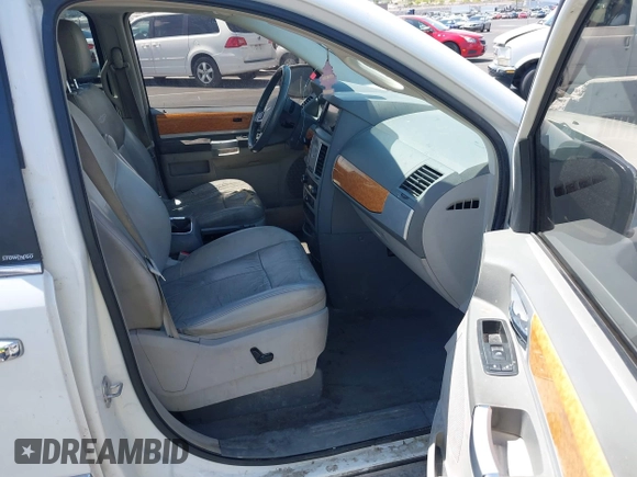 2010 Chrysler Town & Country Limited with VIN 2A4RR7DX1AR357668, listed as a IAAI auction lot 42173545 with 114,486 mi miles and . Bid and sale history available at carsss.com. Image 5.