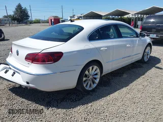2013 Volkswagen CC Lux z VIN WVWHU7AN1DE500722, wystawiony jako IAAI lot #42072779 z przebiegiem 188 987 mil mil oraz . Historia ofert i sprzedaży dostępna na DreamBid. Obrazek 4.