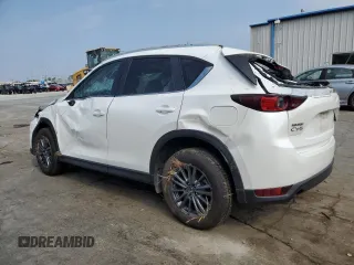 2021 Mazda CX-5 Touring with VIN JM3KFACM1M0405129, listed as a Copart auction lot 67874724 with 49,618 mi miles and Salvage Title. Bid and sale history available at carsss.com. Image 2.