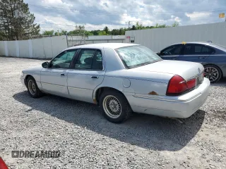 2000 Mercury Grand Marquis LS z VIN 2MEFM75W8YX614309, wystawiony jako Copart lot #61229915 z przebiegiem 228 527 mil mil oraz Szkoda całkowita • Salvage title. Historia ofert i sprzedaży dostępna na DreamBid. Obrazek 2.