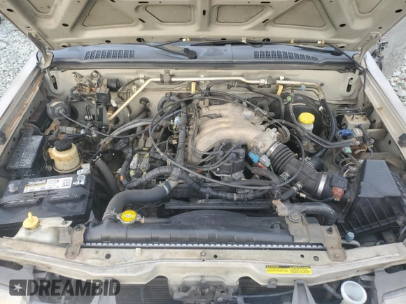 2000 Nissan Frontier XE with VIN 1N6ED27Y3YC366060, listed as a Copart auction lot 48955585 with 158,565 mi miles and Salvage title. Bid and sale history available at DreamBid. Image 13.