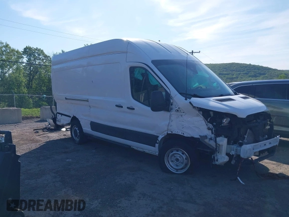 2021 Ford Transit Cargo z VIN 1FTBW3X84MKA60720, wystawiony jako IAAI lot #42202665 z przebiegiem 67 295 mil mil oraz . Historia ofert i sprzedaży dostępna na DreamBid. Obrazek 1.