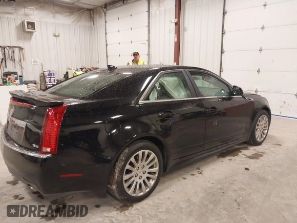 2012 Cadillac CTS Premium with VIN 1G6DP5E30C0108722, listed as a IAAI auction lot 41844089 with 176,525 mi miles and . Bid and sale history available at DreamBid. Image 4.