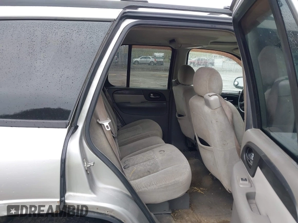2006 GMC Envoy SLE z VIN 1GKDT13S562187698, wystawiony jako IAAI lot #41808778 z przebiegiem 167 023 mil mil oraz . Historia ofert i sprzedaży dostępna na DreamBid. Obrazek 8.