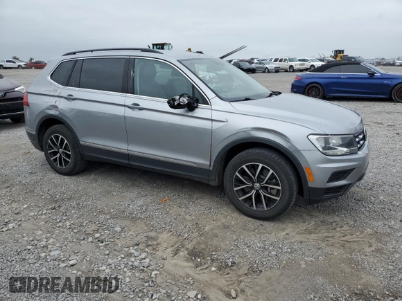2021 Volkswagen Tiguan SE with VIN 3VV3B7AX8MM058499, listed as a Copart auction lot 57127595 with 78,141 mi miles and Salvage title. Bid and sale history available at DreamBid. Image 4.
