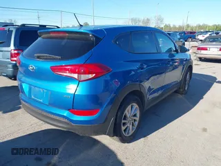 2018 Hyundai Tucson SE z VIN KM8J2CA40JU792495, wystawiony jako IAAI lot #42144647 z przebiegiem 62 769 mil mil oraz . Historia ofert i sprzedaży dostępna na DreamBid. Obrazek 4.