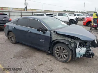 2022 Toyota Avalon XLE with VIN 4T1JZ1FB2NU073049, listed as a IAAI auction lot 41506550 with 52,073 mi miles. Bid and sale history available at carsss.com. Image 1.