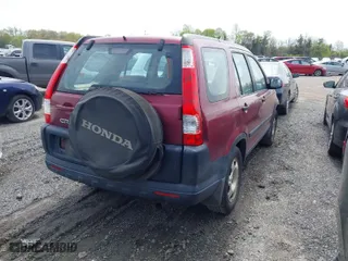 2005 Honda CR-V LX with VIN SHSRD68585U306976, listed as a IAAI auction lot 41999605 with 272,696 mi miles. Bid and sale history available at carsss.com. Image 4.