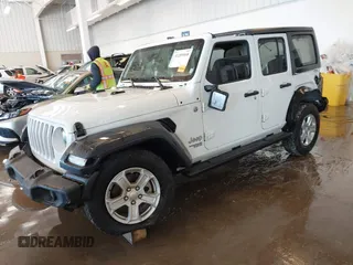2019 Jeep Wrangler Unlimited Sport S with VIN 1C4HJXDG1KW577779, listed as a IAAI auction lot 41289068 with 126,011 mi miles and . Bid and sale history available at DreamBid. Image 2.