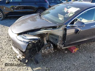 2020 Tesla Model 3 Long Range with VIN 5YJ3E1EB6LF647510, listed as a IAAI auction lot 41692902 with 69,736 mi miles. Bid and sale history available at carsss.com. Image 6.