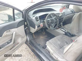 2012 Honda Civic Cpe LX with VIN 2HGFG3B59CH565932, listed as a IAAI auction lot 41949011 with 213,786 mi miles. Bid and sale history available at carsss.com. Image 20.