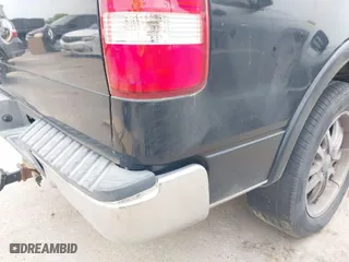 2004 Ford F-150 XL with VIN 1FTPX12524KD88447, listed as a IAAI auction lot 41869907 with 142,165 mi miles. Bid and sale history available at carsss.com. Image 12.