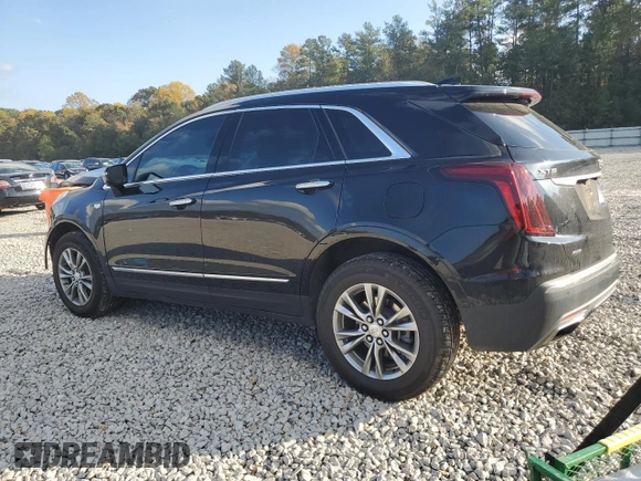 2023 Cadillac XT5 AWD Premium Luxury with VIN 1GYKNDRS7PZ105706, listed as a Copart auction lot 80413084 with 64,508 mi miles and Salvage Title. Bid and sale history available at DreamBid. Image 2.