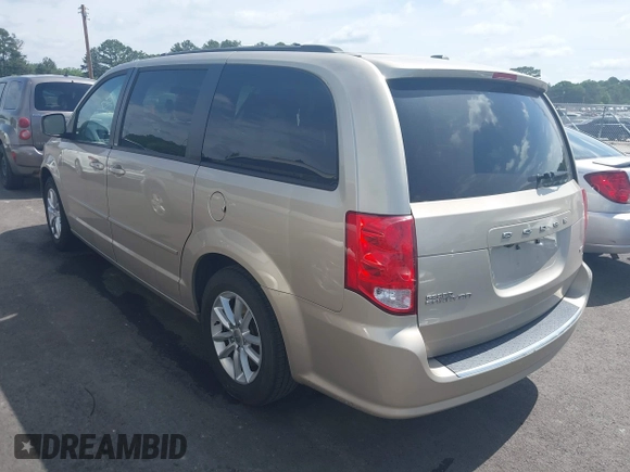 2014 Dodge Grand Caravan SXT z VIN 2C4RDGCG6ER162533, wystawiony jako IAAI lot #42251591 z przebiegiem 70 666 mil mil oraz . Historia ofert i sprzedaży dostępna na DreamBid. Obrazek 3.