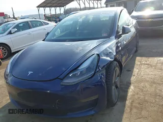 2023 Tesla Model 3 with VIN 5YJ3E1EA1PF655558, listed as a IAAI auction lot 41668827 with 68,778 mi miles and . Bid and sale history available at carsss.com. Image 12.
