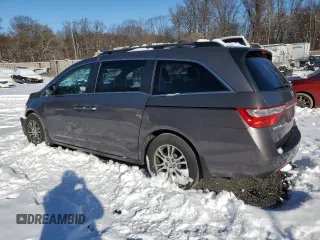 2012 Honda Odyssey EX-L with VIN 5FNRL5H66CB023339, listed as a Copart auction lot 86205974 with 136,087 mi miles and Salvage Title. Bid and sale history available at carsss.com. Image 2.
