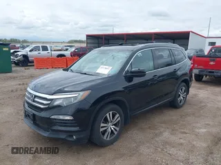 2017 Honda Pilot EX-L with VIN 5FNYF6H51HB045854, listed as a IAAI auction lot 42178053 with 114,913 mi miles and . Bid and sale history available at DreamBid. Image 2.
