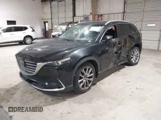 2016 Mazda CX-9 Signature z VIN JM3TCBEY5G0111286, wystawiony jako IAAI lot #42018161 z przebiegiem 155 920 mil mil oraz . Historia ofert i sprzedaży dostępna na DreamBid. Obrazek 2.