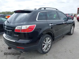 2011 Mazda CX-9 Grand Touring z VIN JM3TB2DAXB0300466, wystawiony jako IAAI lot #41921411 z przebiegiem 196 257 mil mil oraz . Historia ofert i sprzedaży dostępna na DreamBid. Obrazek 4.