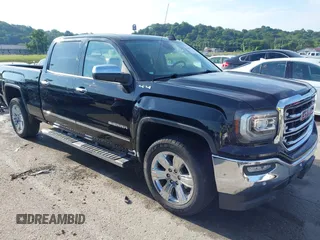 2018 GMC Sierra 1500 SLT with VIN 3GTU2NEC0JG329757, listed as a IAAI auction lot 42591222 with 36,115 mi miles and . Bid and sale history available at DreamBid. Image 1.