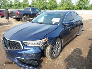 2019 Acura TLX z VIN 19UUB1F37KA010834, wystawiony jako IAAI lot #42448379 z przebiegiem 83 098 mil mil oraz . Historia ofert i sprzedaży dostępna na DreamBid. Obrazek 2.