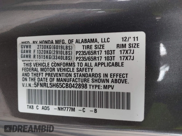2012 Honda Odyssey EX-L with VIN 5FNRL5H65CB042898, listed as a IAAI auction lot 41784075 with 179,596 mi miles and . Bid and sale history available at carsss.com. Image 9.