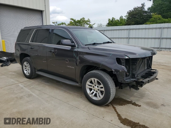 2015 Chevrolet Tahoe LS with VIN 1GNSCAKC8FR243239, listed as a Copart auction lot 53604445 with 155,881 mi miles and Salvage title. Bid and sale history available at DreamBid. Image 4.