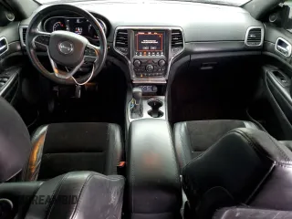 2018 Jeep Grand Cherokee Laredo E with VIN 1C4RJFAG6JC215692, listed as a Copart auction lot 46873295 with 79,396 mi miles and Salvage Title. Bid and sale history available at DreamBid. Image 8.