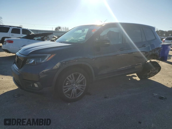 2019 Honda Passport EX-L with VIN 5FNYF7H55KB011252, listed as a Copart auction lot 82930234 with 61,777 mi miles and Salvage Title. Bid and sale history available at carsss.com. Image 1.