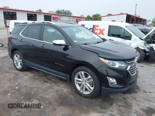 2019 Chevrolet Equinox Premier z VIN 2GNAXPEXXK6136734, wystawiony jako IAAI lot #42436313 z przebiegiem 33 426 mil mil oraz . Historia ofert i sprzedaży dostępna na DreamBid. Obrazek 1.