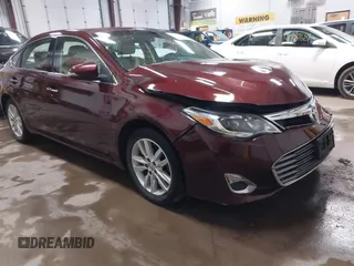 2014 Toyota Avalon Limited z VIN 4T1BK1EB9EU120734, wystawiony jako IAAI lot #41984803 z przebiegiem 80 747 mil mil oraz . Historia ofert i sprzedaży dostępna na DreamBid. Obrazek 1.