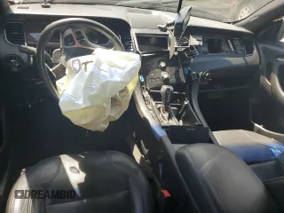 2015 Ford Taurus Limited z VIN 1FAHP2F87FG170997, wystawiony jako Copart lot #54346554 z przebiegiem Nie podano mil oraz Szkoda całkowita • Salvage title. Historia ofert i sprzedaży dostępna na DreamBid. Obrazek 8.