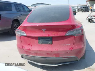2023 Tesla Model Y Long Range z VIN 7SAYGAEE7PF691499, wystawiony jako IAAI lot #42038850 z przebiegiem 26 439 mil mil oraz . Historia ofert i sprzedaży dostępna na DreamBid. Obrazek 17.