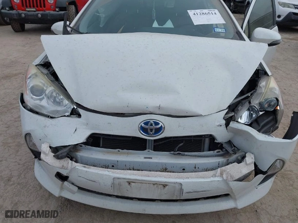 2014 Toyota Prius c One with VIN JTDKDTB31E1559712, listed as a IAAI auction lot 41286514 with 173,321 mi miles. Bid and sale history available at carsss.com. Image 6.