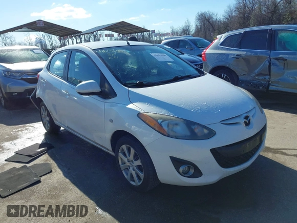 2012 Mazda 2 Touring z VIN JM1DE1LY2C0134281, wystawiony jako IAAI lot #41613690 z przebiegiem 156 546 mil mil oraz . Historia ofert i sprzedaży dostępna na DreamBid. Obrazek 1.