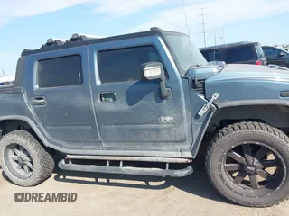 2006 Hummer H2 with VIN 5GRGN22U06H103326, listed as a IAAI auction lot 41474829 with 217,436 mi miles. Bid and sale history available at carsss.com. Image 13.