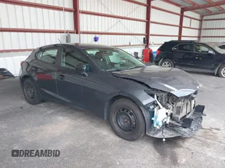 2015 Mazda 3 i Sport z VIN 3MZBM1K74FM156168, wystawiony jako IAAI lot #39673992 z przebiegiem 164 007 mil mil oraz . Historia ofert i sprzedaży dostępna na DreamBid. Obrazek 1.