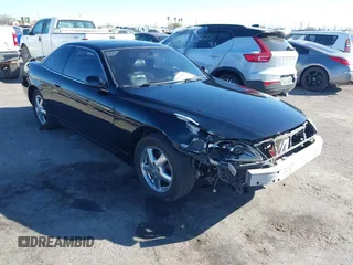 1999 Lexus SC 400 z VIN JT8CH32Y4X1002413, wystawiony jako IAAI lot #41331493 z przebiegiem 163 061 mil mil oraz . Historia ofert i sprzedaży dostępna na DreamBid. Obrazek 1.
