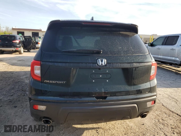 2019 Honda Passport EX-L with VIN 5FNYF7H56KB003404, listed as a Copart auction lot 53935625 with 66,890 mi miles and Salvage title. Bid and sale history available at DreamBid. Image 6.
