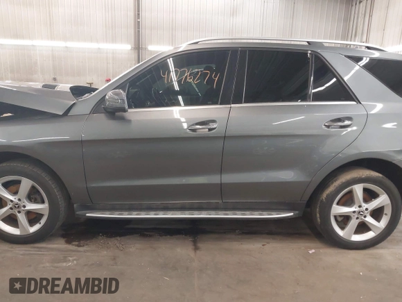 2018 Mercedes-Benz GLE 350 with VIN 4JGDA5JB3JA997403, listed as a IAAI auction lot 41776274 with 104,359 mi miles and . Bid and sale history available at DreamBid. Image 15.